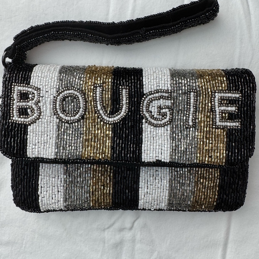 Beaded “Bougie” wristlet. In great condition. Never used.